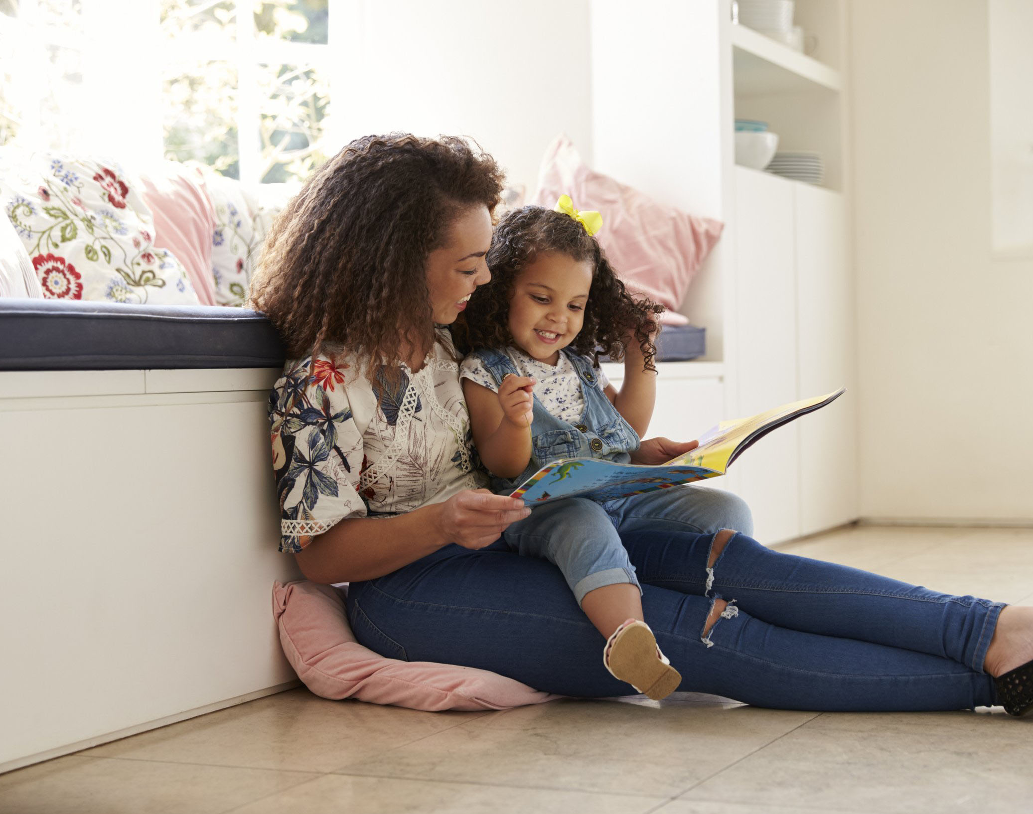 Mother and daughter reading